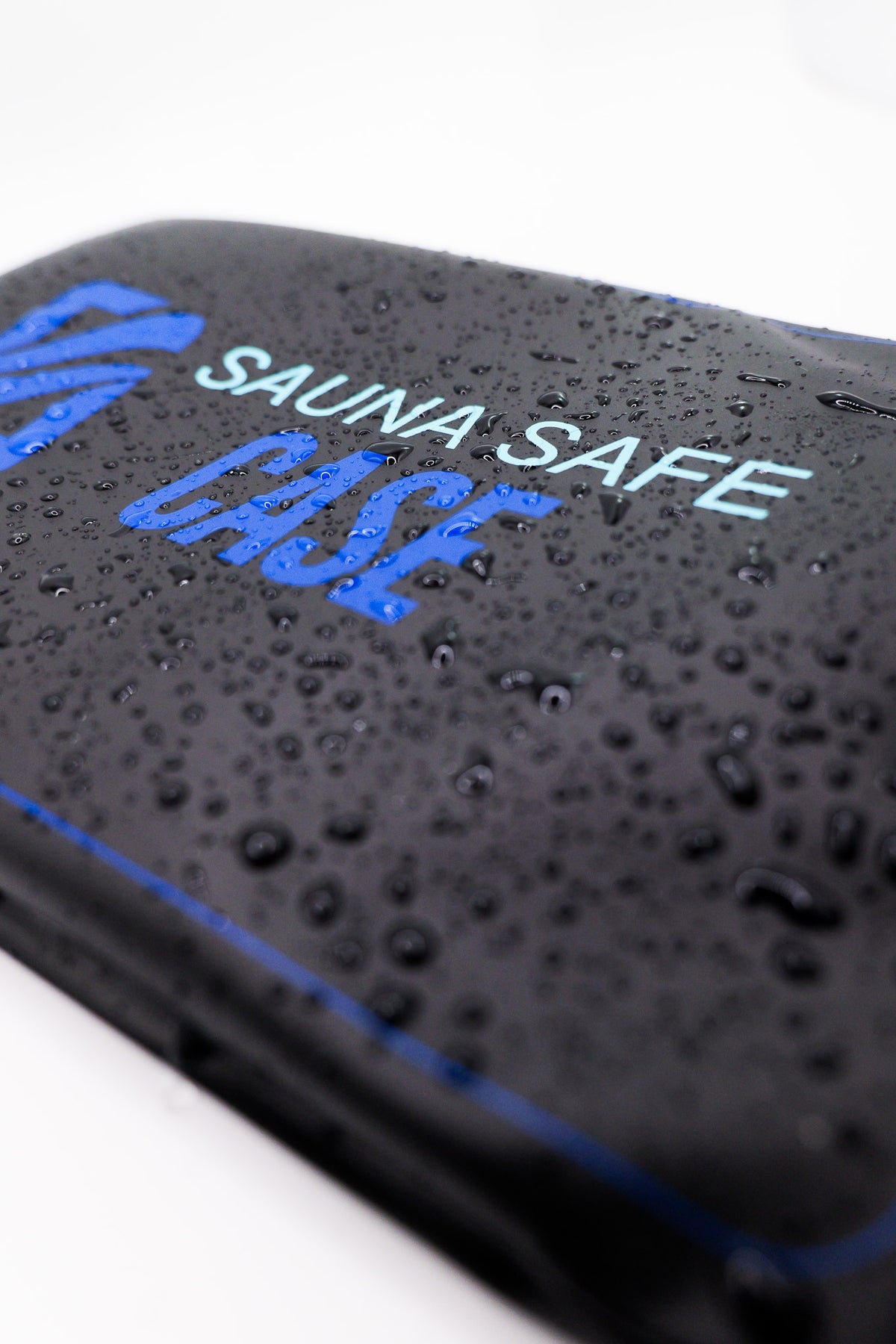 Close-up of the Sauna Safe Case logo with water droplets